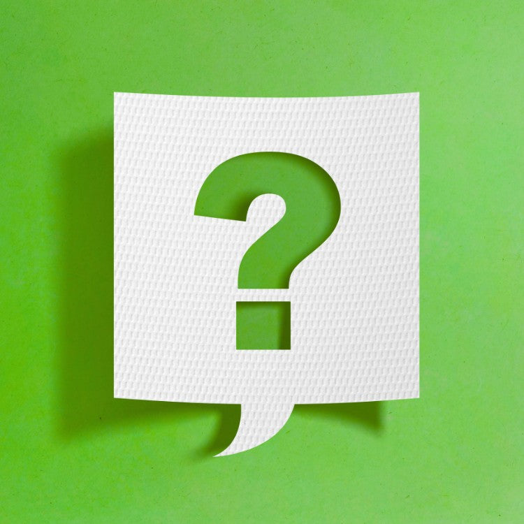 Point d’interrogation blanc découpé dans une bulle sur fond vert, illustrant l’article « D’où viennent les algues en aquarium ? »